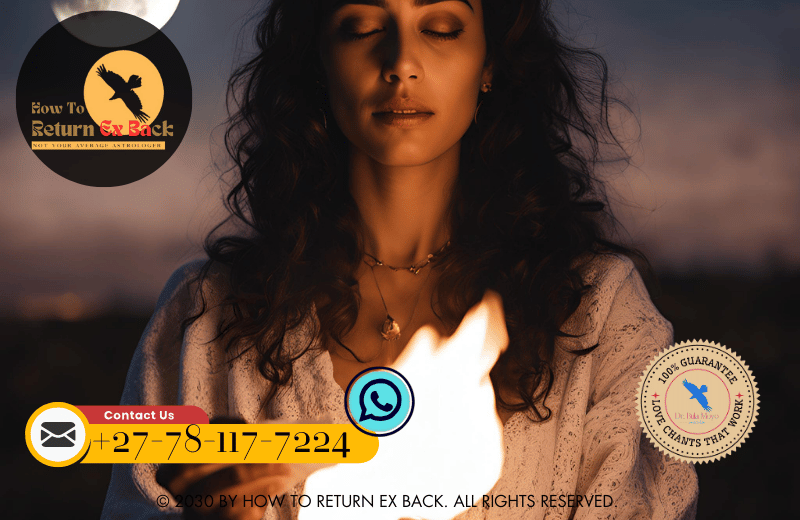 A person holding a burning piece of paper under the moonlight, symbolizing the release of past hurts during a moon ritual.