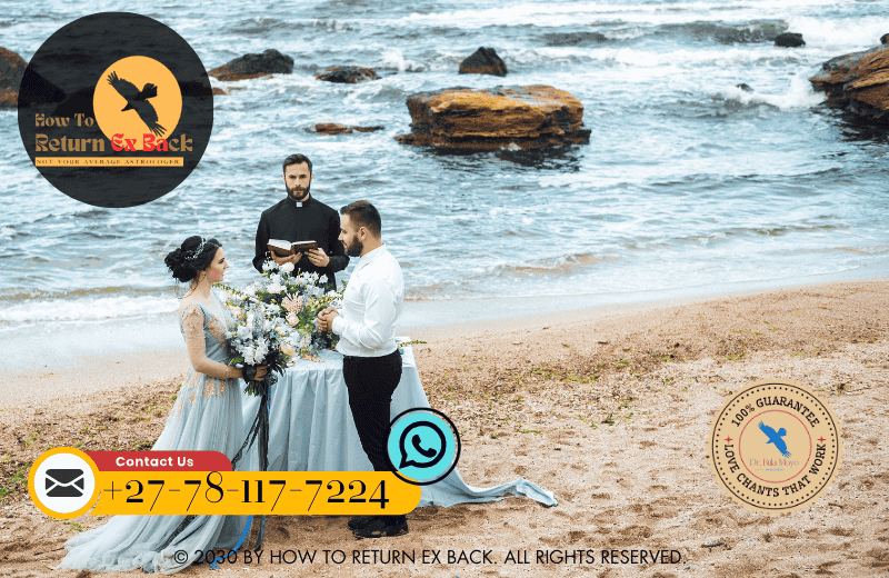 A couple standing at a beach, exchanging vows during a private vow renewal ceremony to reaffirm their love and commitment.