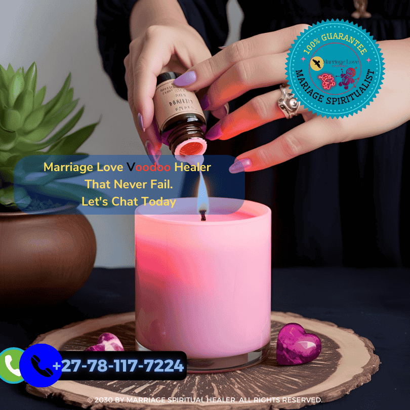 Witch anointing a pink candle for a DIY love ritual
